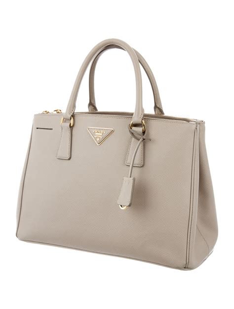 prada galleria double zip tote saffiano with accessories medium pomice|prada saffiano leather bag.